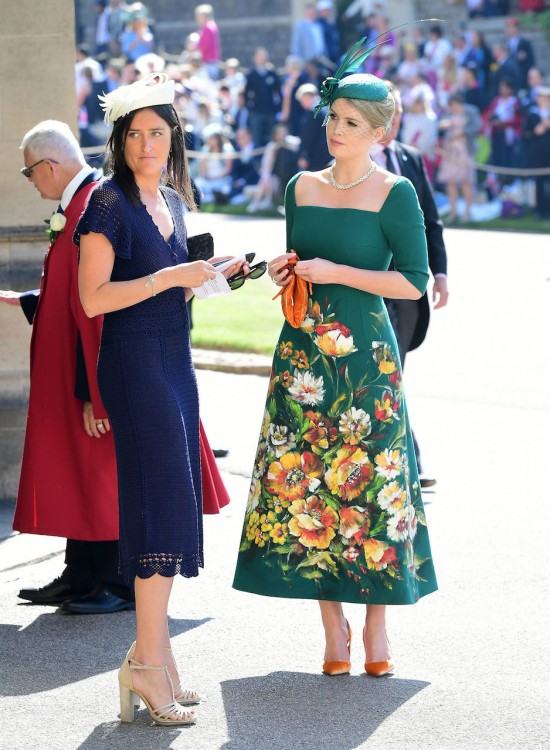 Oprah arrived at the Royal Wedding in a dress by Stella McCartney, a bag by  Gabriela Hearst, Aquazurra pumps and a hat by Philip Treacy