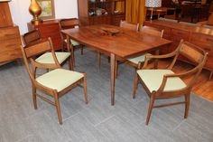 A patio set on a brown outdoor carpet