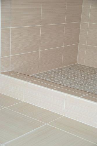 frosted sage green glass subway tiles in shower built linen closet tile  bathroom with white
