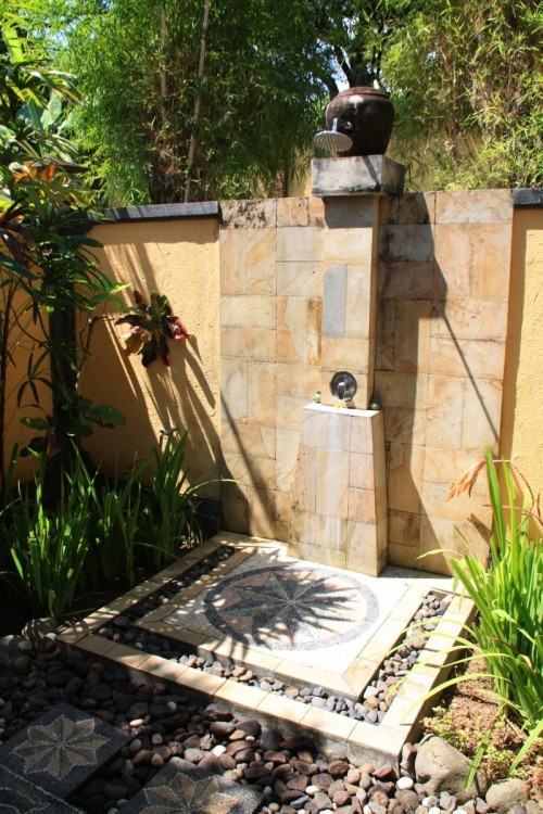 Farmhouse Outdoor Shower With a Turquoise Chandelier