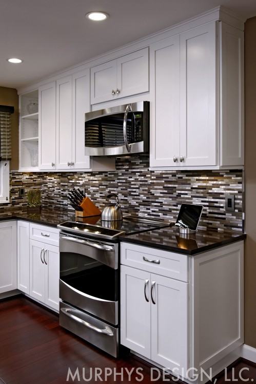 remodeled kitchen in yorktown virginia with custom cabinets, kitchen  island, tiled backsplash,