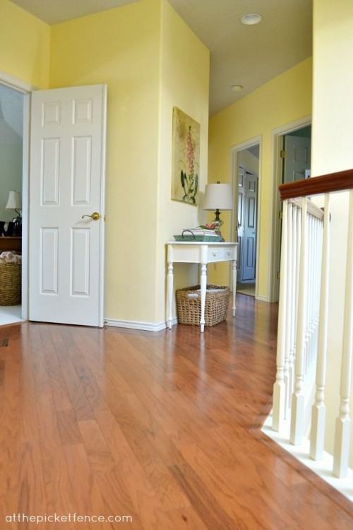 Originally I was going to use this gorgeous rug in our upstairs hallway,  but it was just a bit large for that area, so I decided to use the rug  downstairs