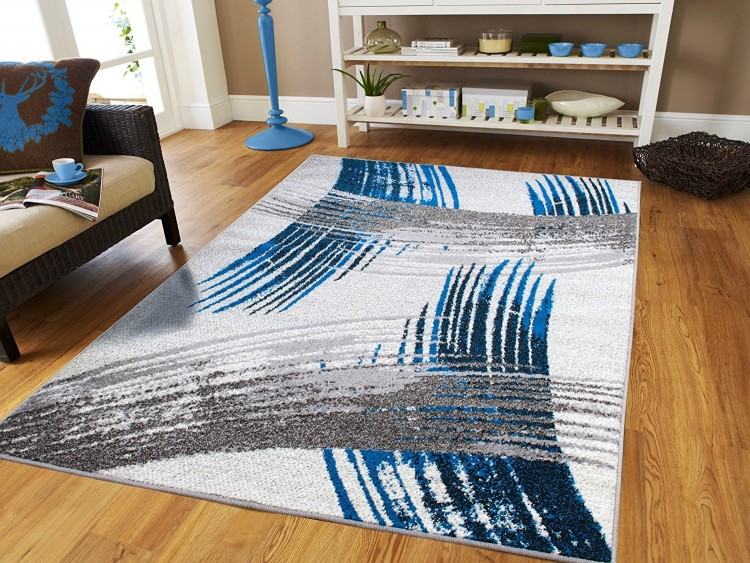 Bright area rug in white bedroom