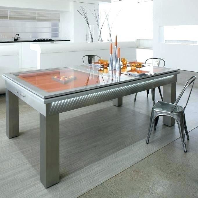 The Fusion Pool Table by Aramith is a clean, modern dining room table that  doubles as a pool table