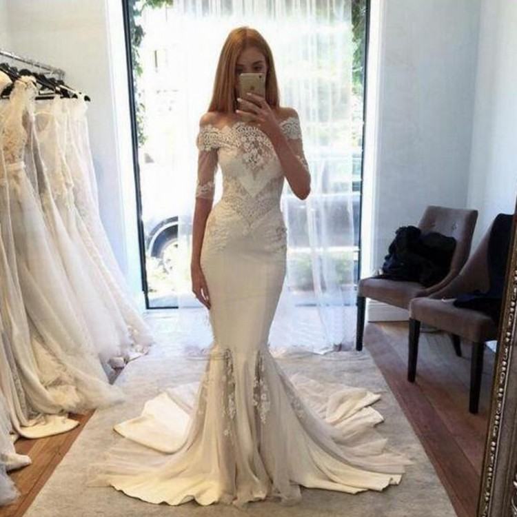 White off shoulder mermaid dress with train