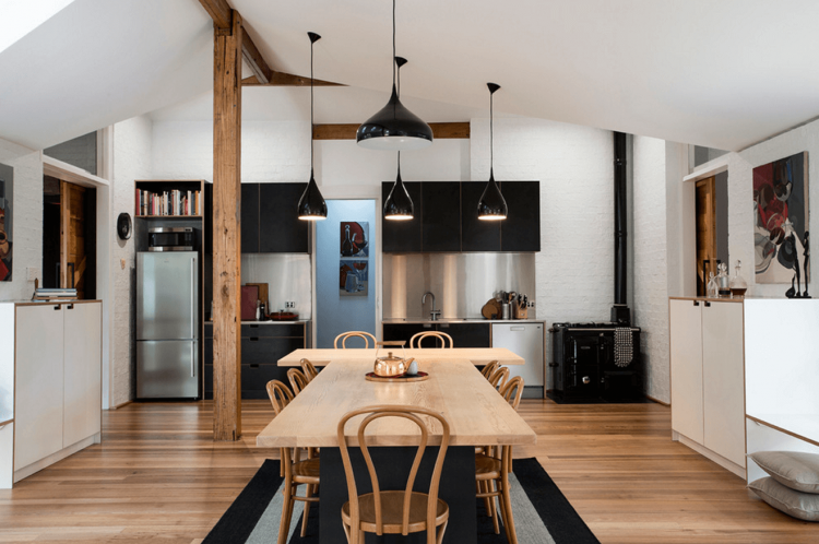 brown wooden kitchen cabinet and soft green tile backsplash also  stainless steel hood over