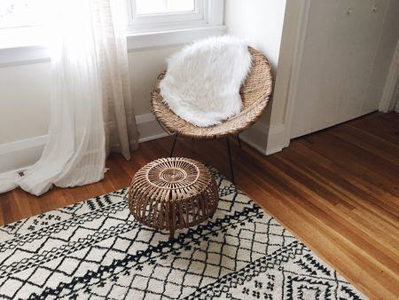 White lacquer campaign desk, geometric print rug