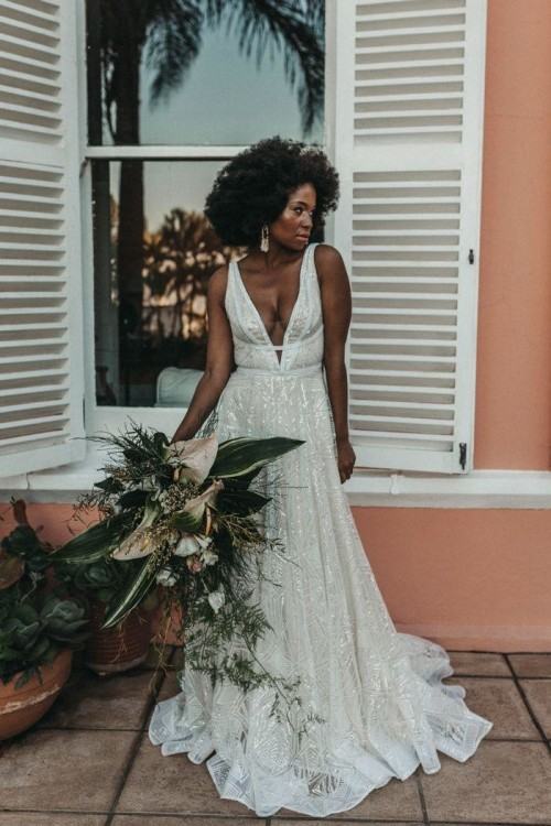 We love Make Up by Charelle's approach to  beauty for this styled shoot: stunningly natural hair, lush lashes, bold  lips and a